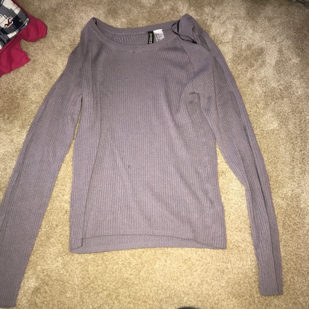 Long sleeve shirt, several circles in each sleeve
